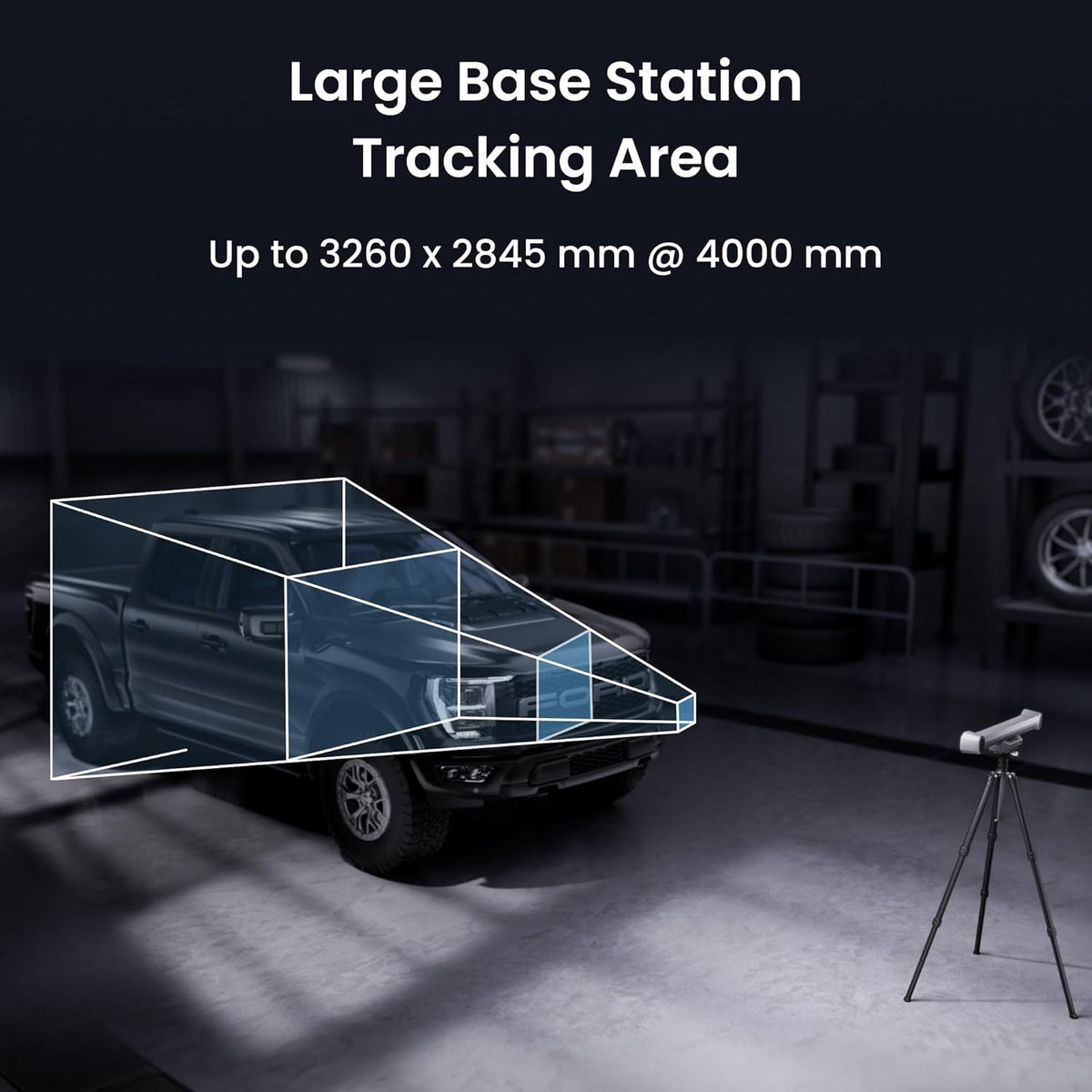 Large base station tracking area with a vehicle and equipment in a dark setting