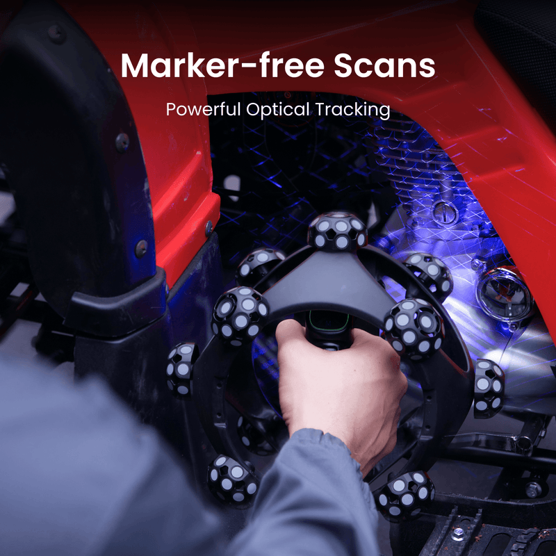 A hand holding a black circular tracking device with multiple spherical sensors, shown in a red and blue vehicle interior. White text at the top reads 'Marker-free Scans' and 'Powerful Optical Tracking'.