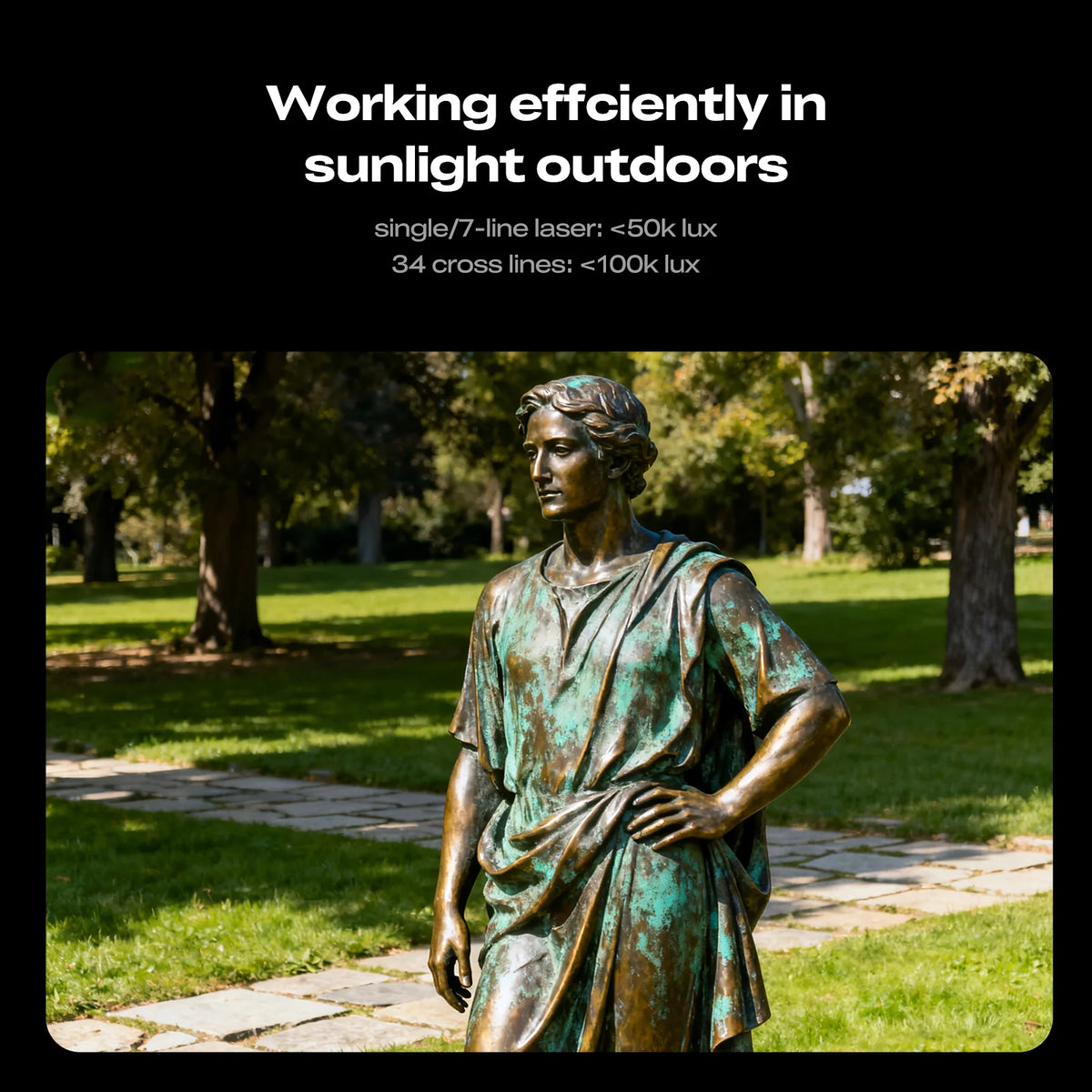Bronze statue in a park with sunlight and shadows.