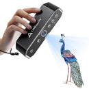 Hand holding a Creality 3D scanner with a peacock illustration on a white background