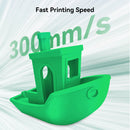 Green 3D-printed object with 'Fast Printing Speed 300mm/s' text on a white background