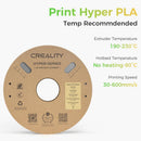 A spool of Creality Hyper Series PLA 3D printer filament shown on a white background with green and black text detailing recommended temperatures and printing speed.