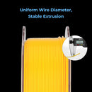 Yellow spool of wire with a digital caliper showing uniform diameter on a black background