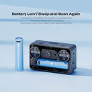 A portable flashlight device shown open with a blue battery inserted, alongside a separate matching blue battery on a light blue background. Text at the top reads, 'Battery Low? Swap and Scan Again' with smaller descriptive copy about including two 3,350 mAh quick-swap batteries.