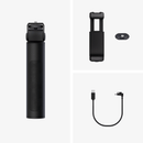 Black pepper spray canister with holster and cable on a white background