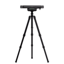A black tripod with three adjustable legs and a central mounting head holding a long, narrow horizontal device, shown against a plain white background.